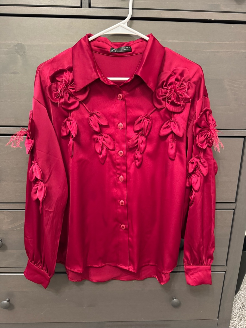 Red Satin Button-Up Blouse with Floral Appliqué